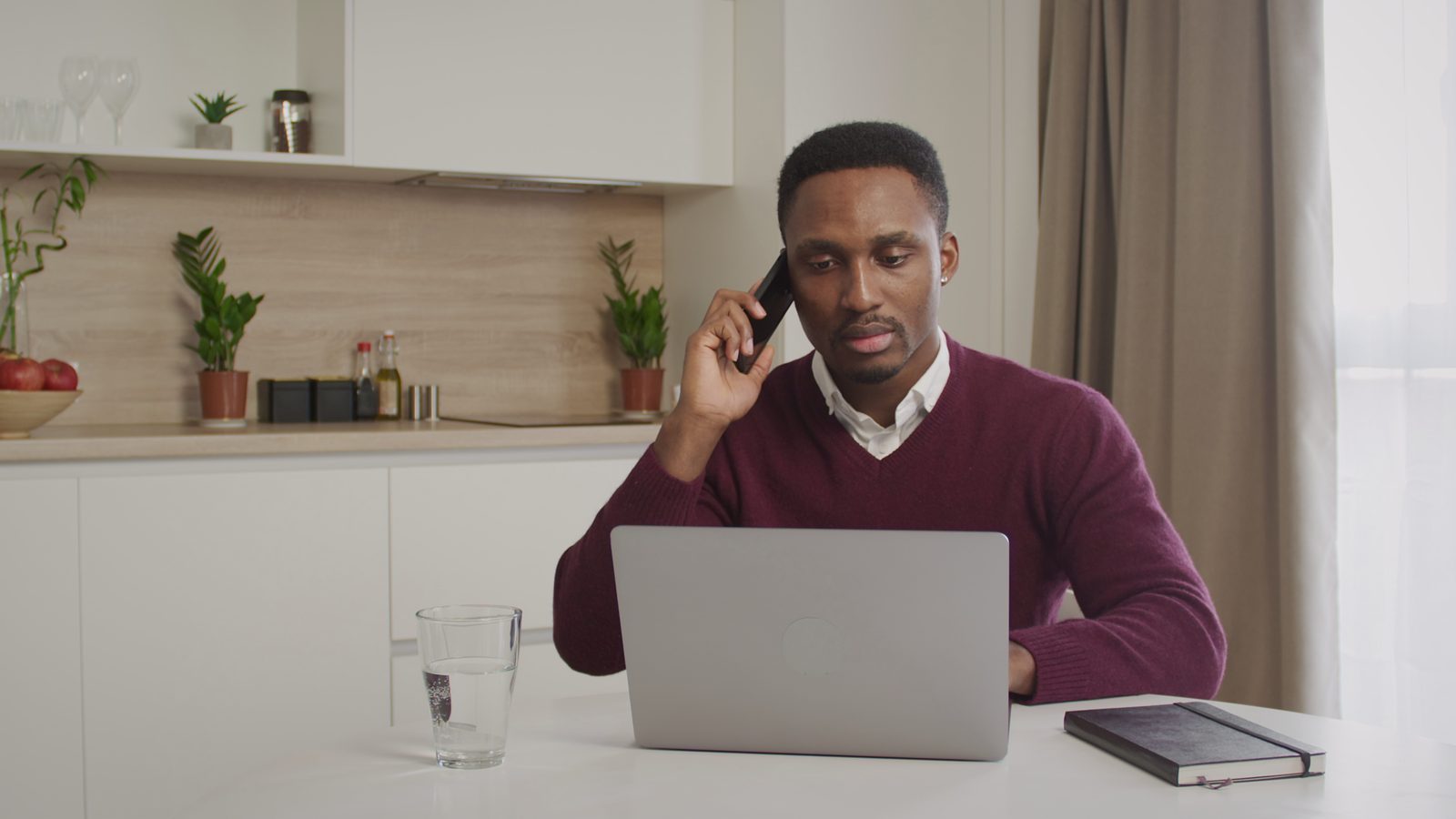 Man working from home getting fast remote IT support on his laptop